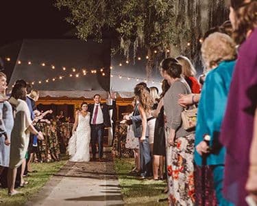 Wedding party at Legare Waring House moss-draped oaks