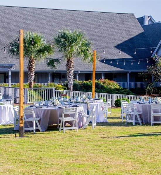 Outdoor wedding dining on Magnolia Lawn at Litchfield Beach Golf Resort Pawleys Island