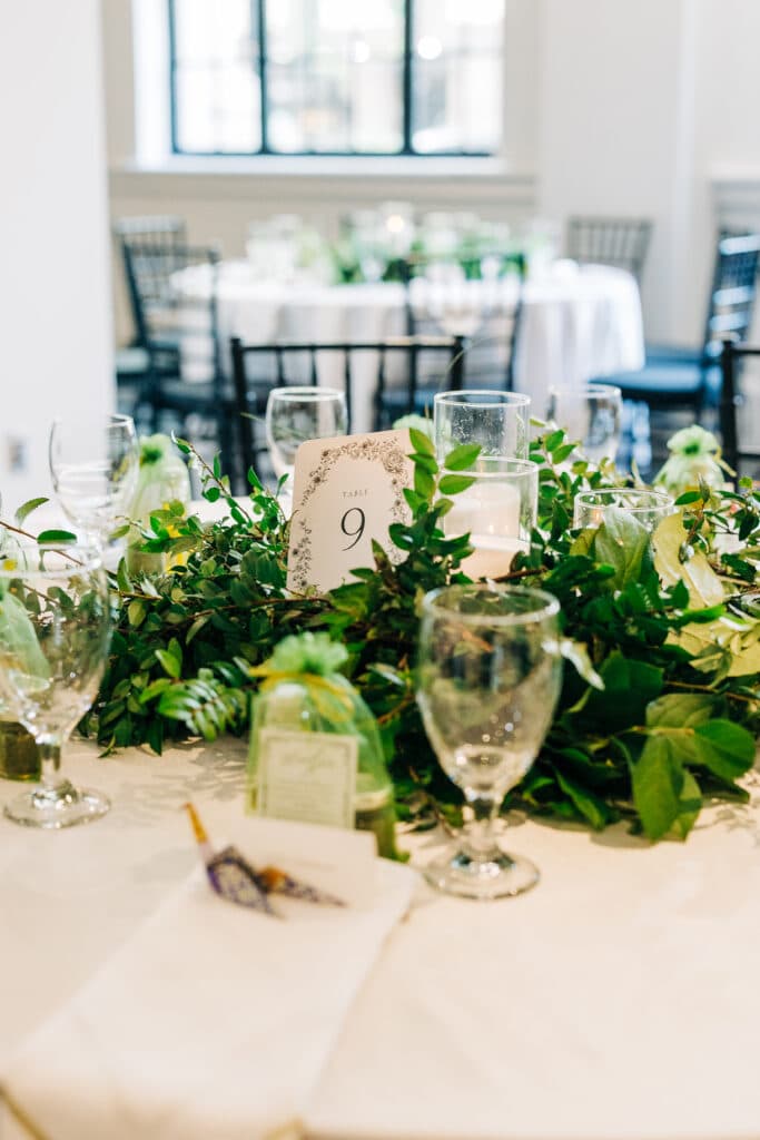 Elegant wedding centerpiece at 1208 Washington Place 1924 historic bank venue