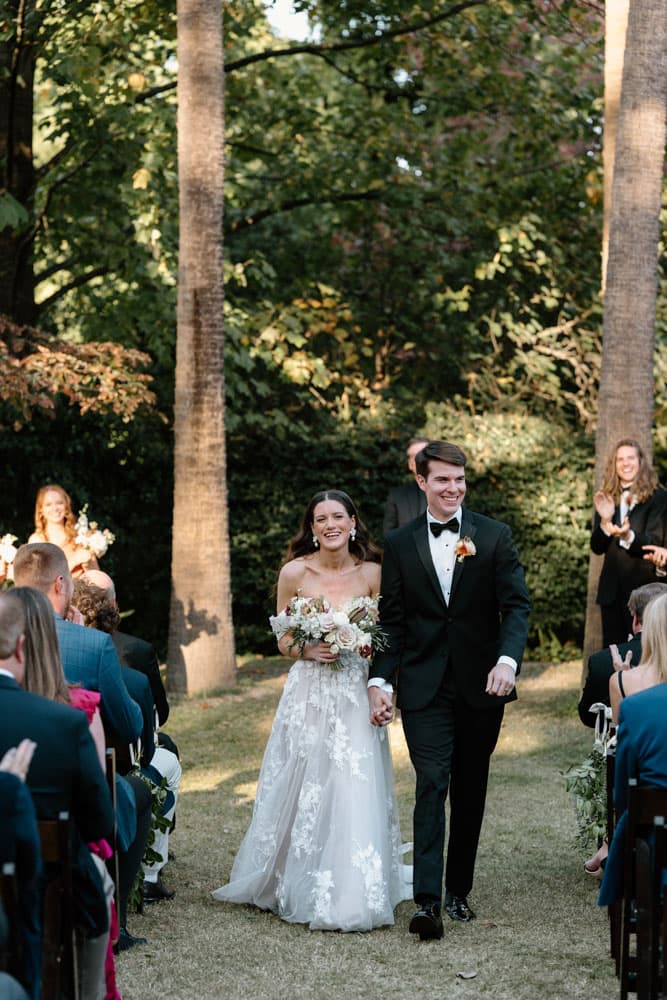 Bride walking down the aisle at Columbia SC wedding by Emily Veinberg Photography