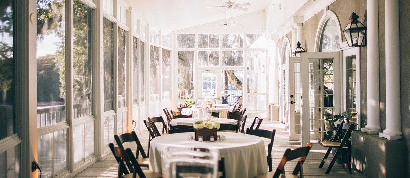 Kimbels at Wachesaw Plantation Club veranda wedding reception tables Murrells Inlet