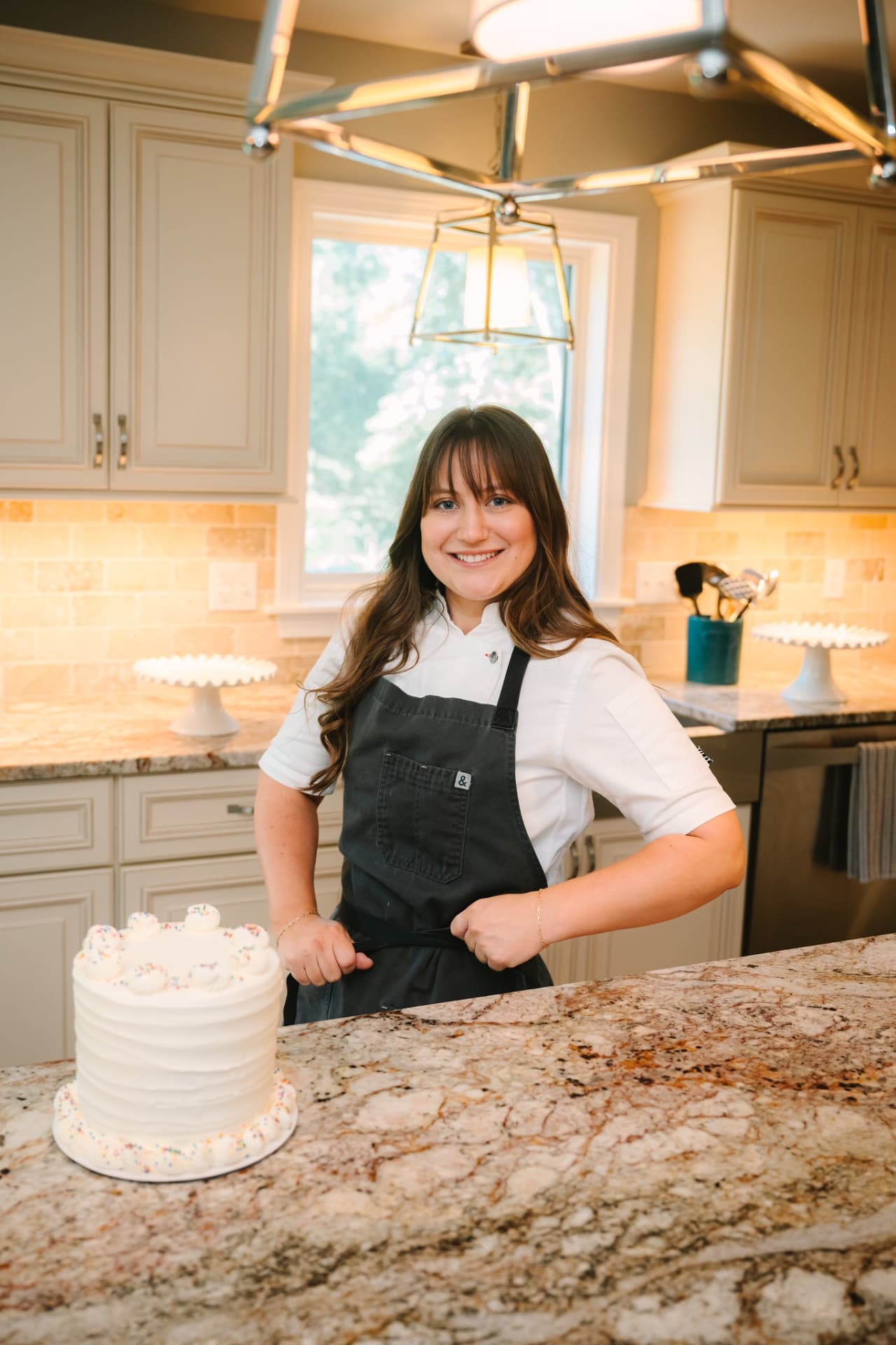 Spilled Milk Cake Boutique - Alexandra Kowaleski with a custom celebration cake at