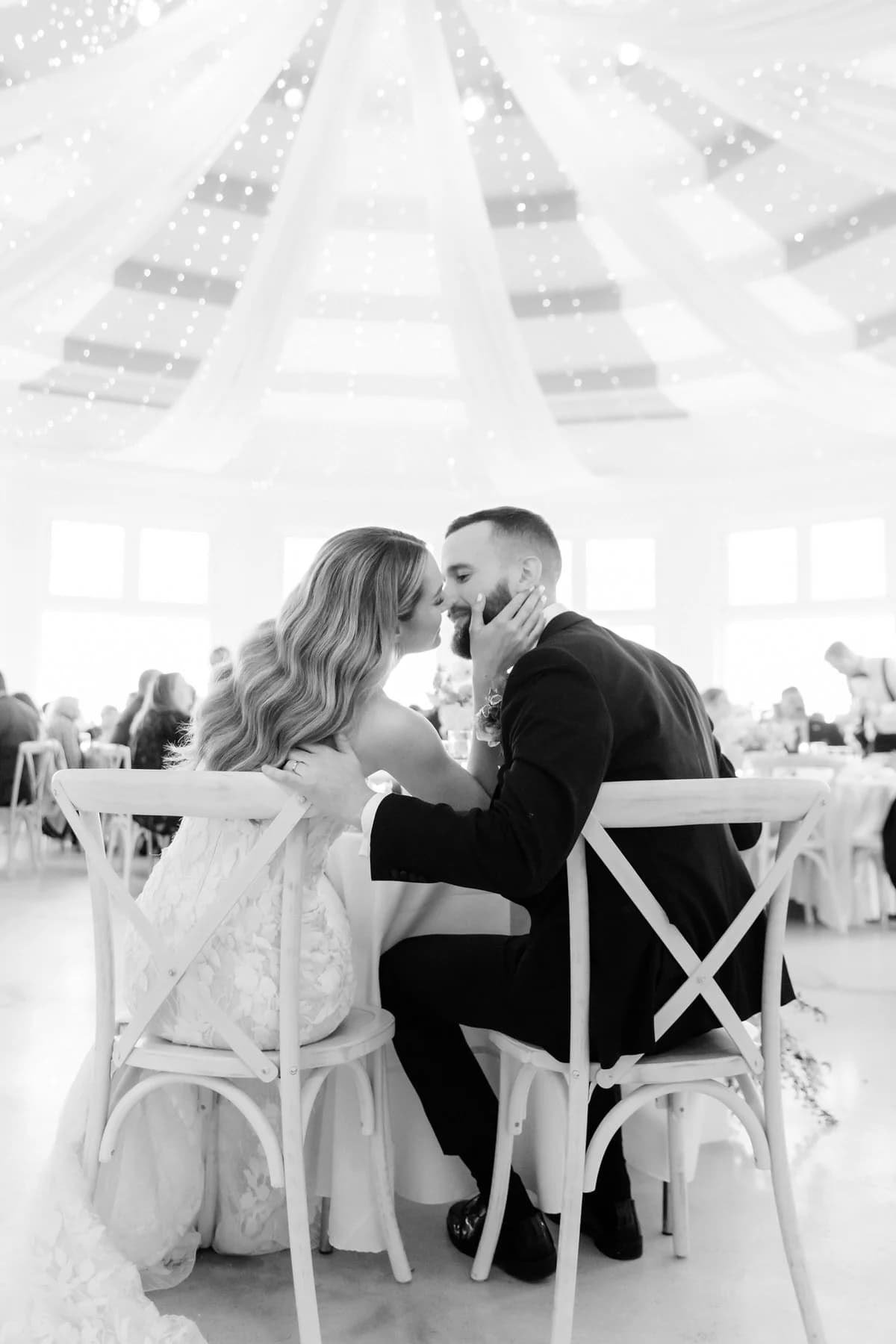 Bride and groom near kiss at elegant rotunda wedding venue